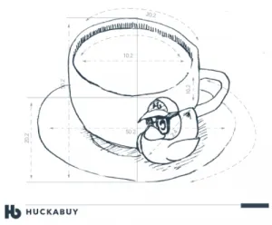 Huckabuy developers next to a coffee cup
